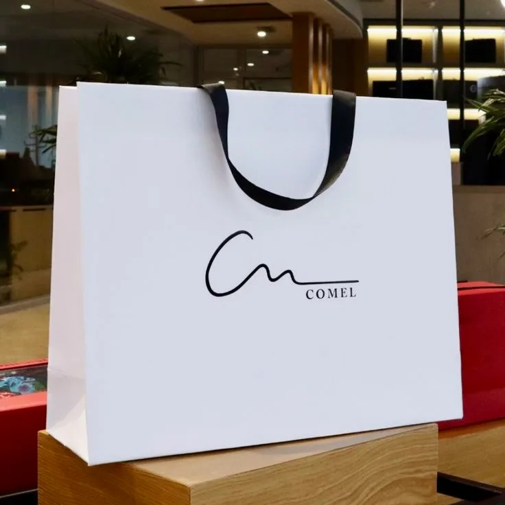 Custom Luxury Ribbon Handle White Art Cardboard Shopping Bags Luxury Clothing Packaging for Socks Fur Personalized Your Own Logo